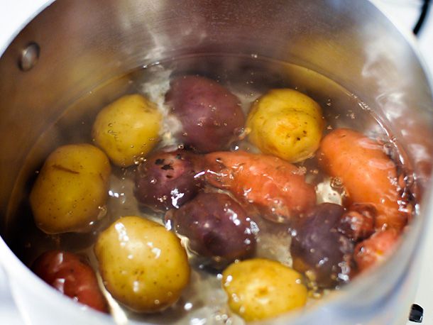 Boiling potatoes in a pot.